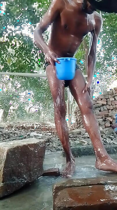 I bathe in a public place. Desi village boy